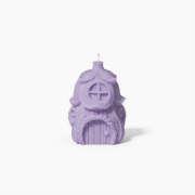 Whimsical home decor miniature fairy house candle glowing in soft light