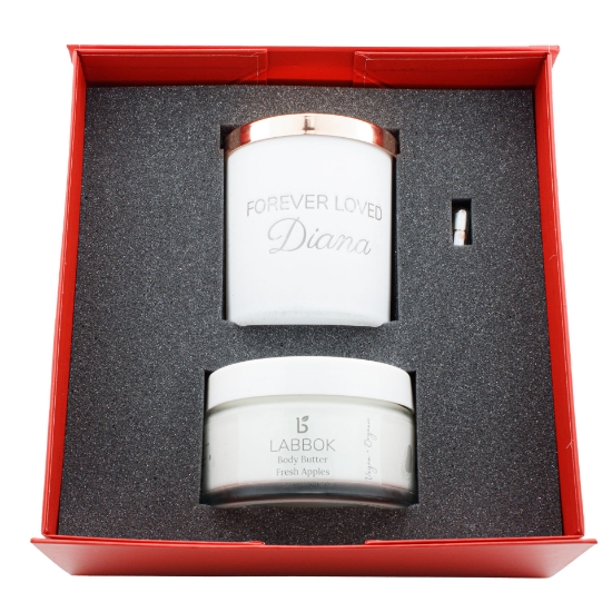 Handcrafted olive oil candle with Eternal Rose fragrance in elegant packaging.